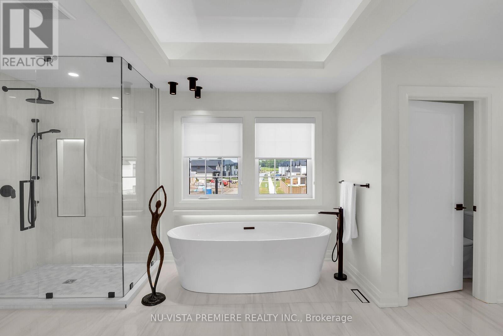 Photos of similar model. This home is to be built! - 7301 Silver Creek Circle, London South (South V), ON - Indoor Photo Showing Bathroom