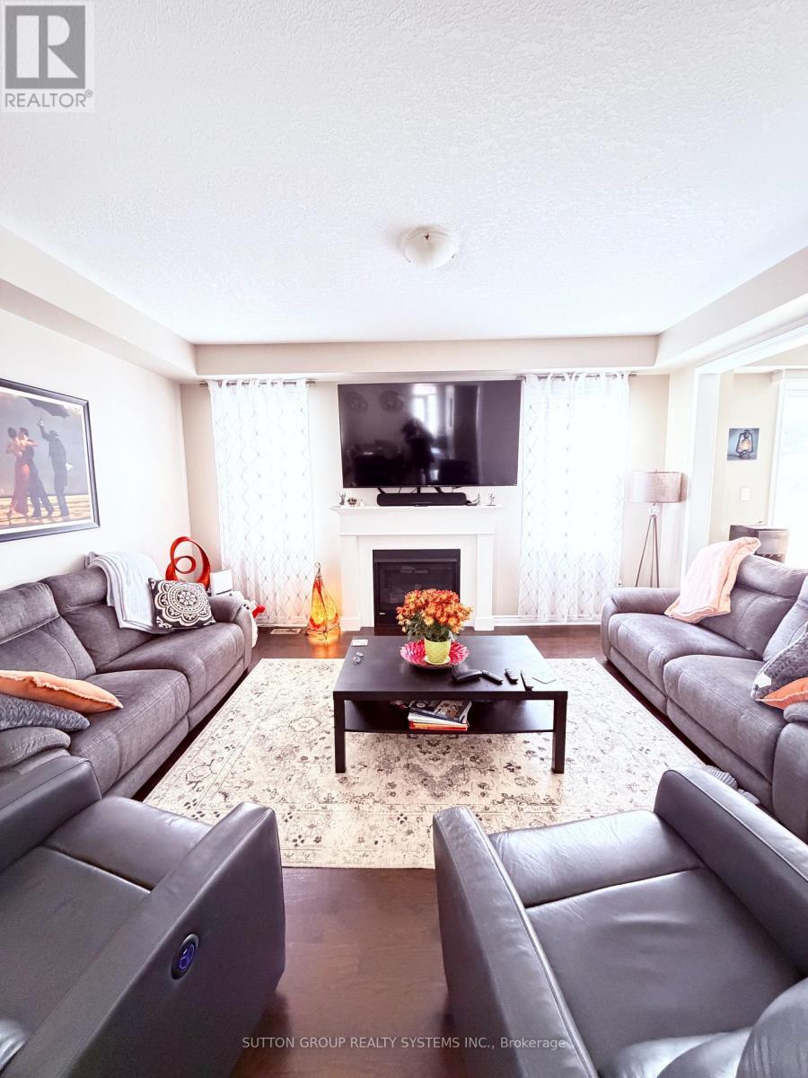 693 Doon South Drive, Kitchener, ON - Indoor Photo Showing Living Room With Fireplace
