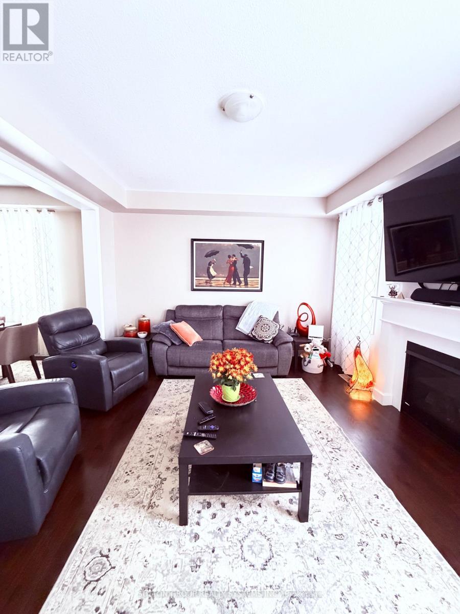 693 Doon South Drive, Kitchener, ON - Indoor Photo Showing Living Room With Fireplace