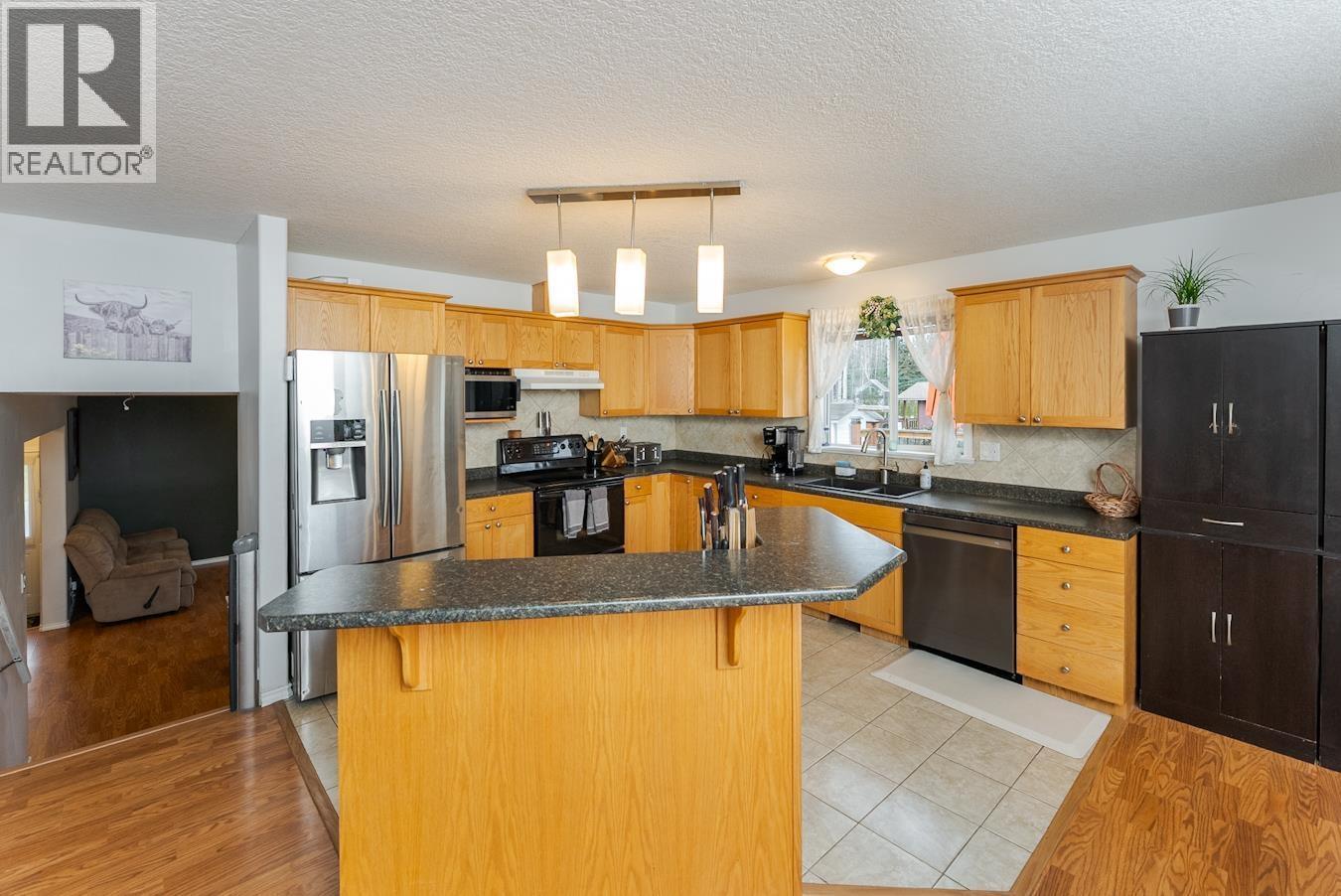 8311 Flamingo Road, Prince George, BC - Indoor Photo Showing Kitchen With Double Sink