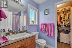 Secondary bedroom ensuite with a tub shower -