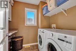 Full laundry room on the upper level -