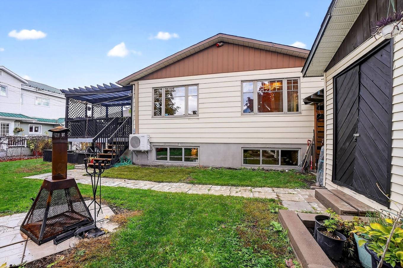 Backyard - 3215 Rue De Mayfair, Longueuil (Saint-Hubert), QC - Outdoor With Exterior