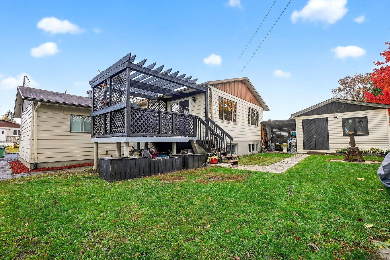 Backyard - 3215 Rue De Mayfair, Longueuil (Saint-Hubert), QC - Outdoor With Exterior