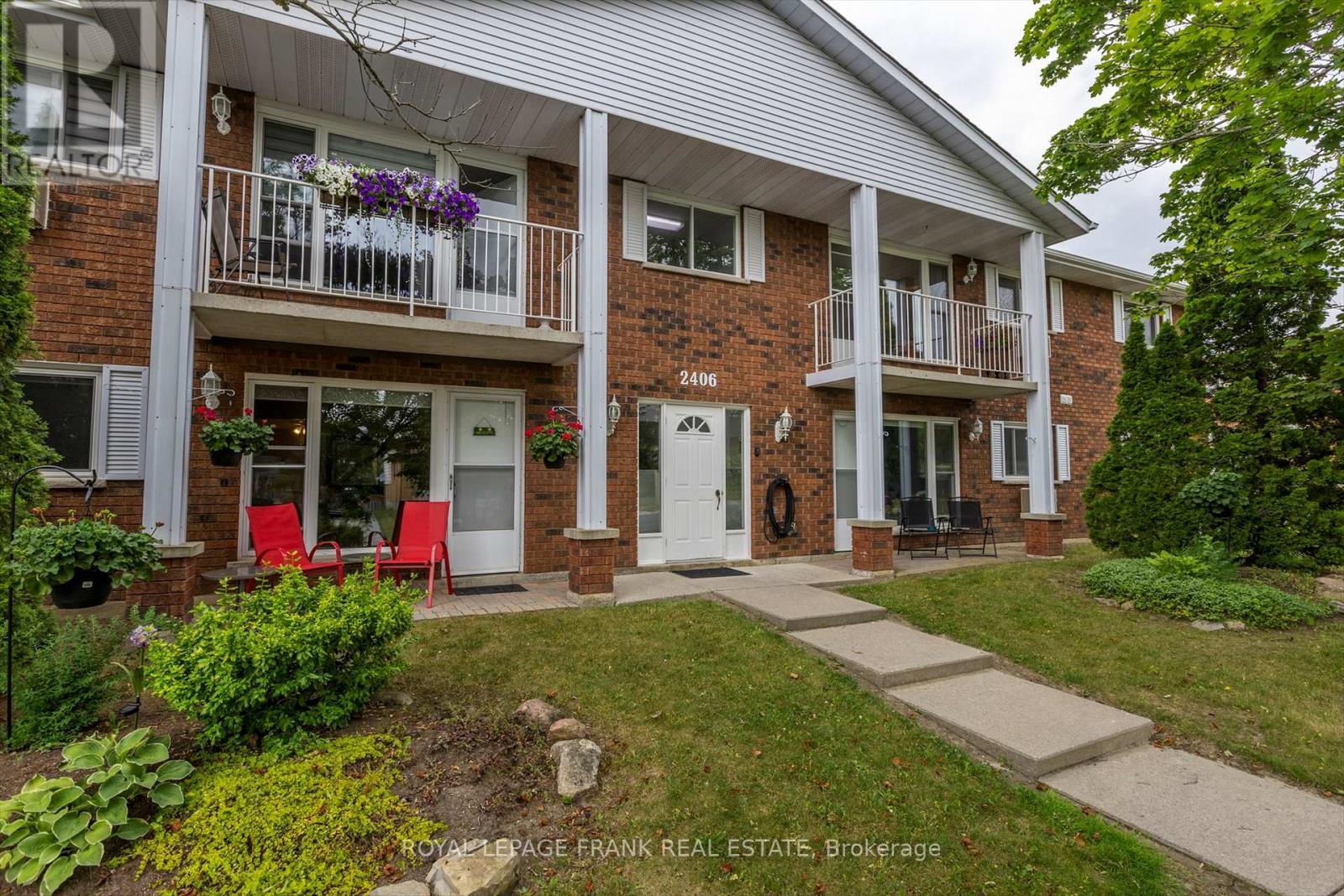 201 - 2406 Mountland Drive, Peterborough (Monaghan Ward 2), ON - Outdoor With Balcony With Facade