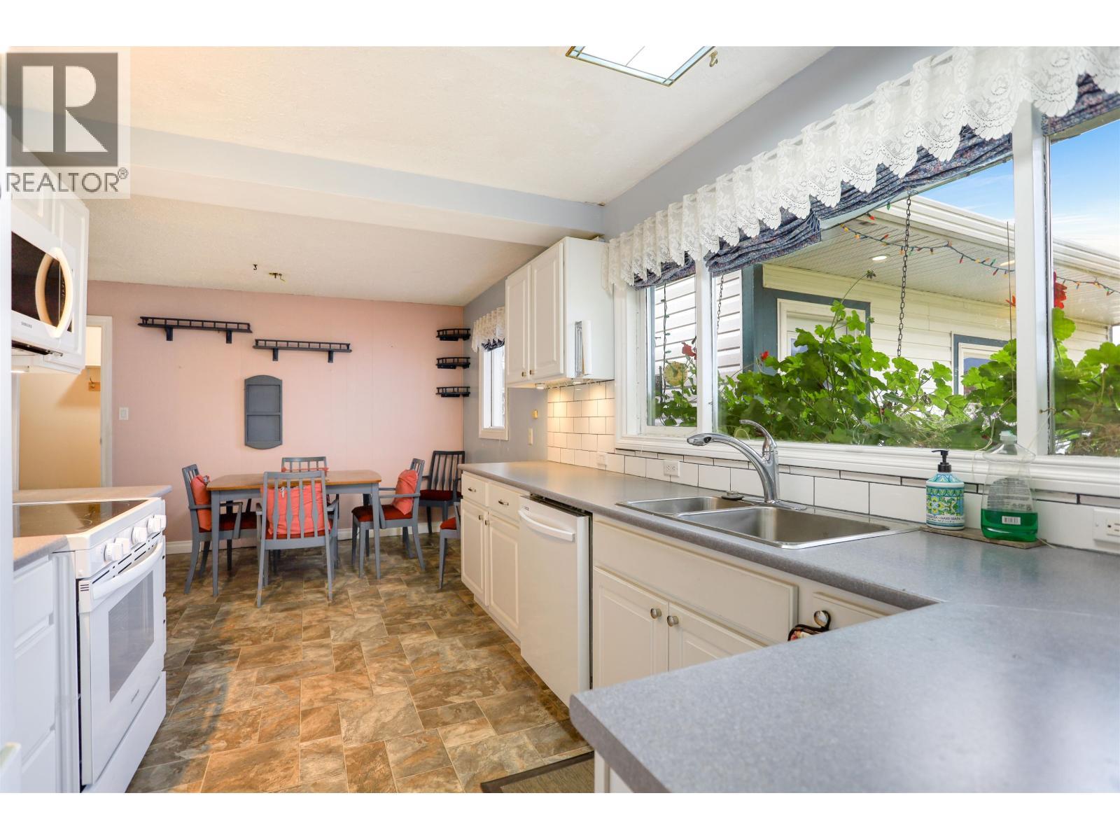 54 Skeena Street, Kitimat, BC - Indoor Photo Showing Kitchen With Double Sink