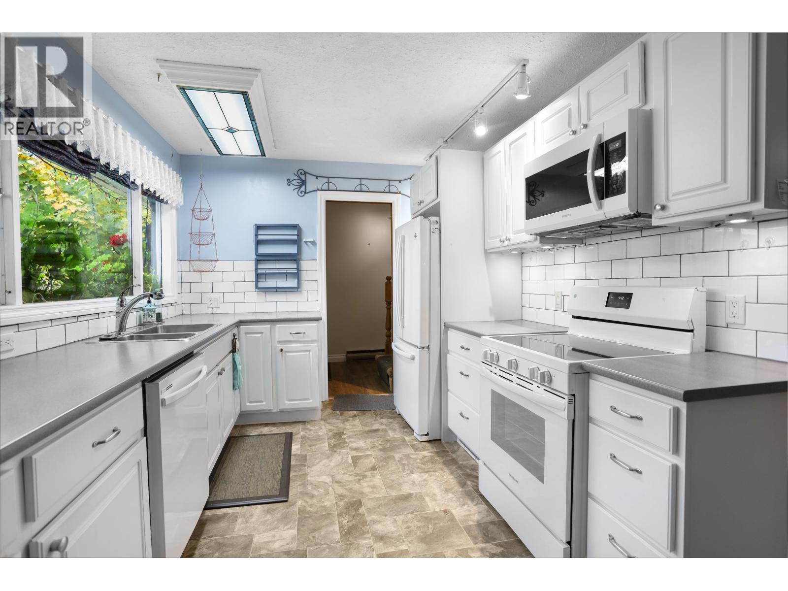 54 Skeena Street, Kitimat, BC - Indoor Photo Showing Kitchen With Double Sink
