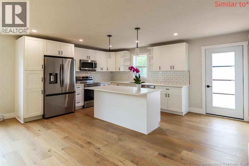 19 Bellbottom Way, Quispamsis, NB - Indoor Photo Showing Kitchen With Upgraded Kitchen