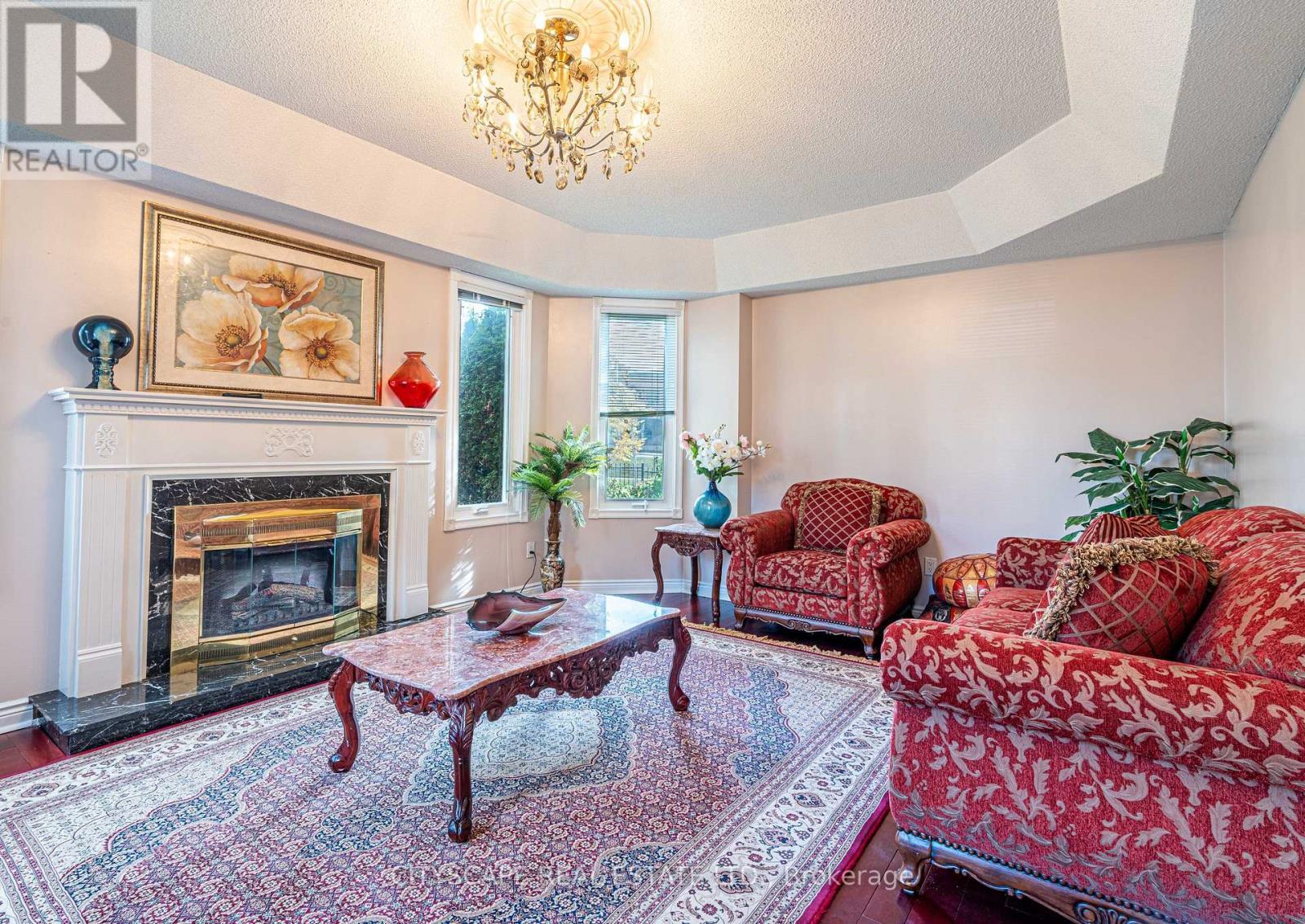3721 Trelawny Circle, Mississauga, ON - Indoor Photo Showing Living Room With Fireplace