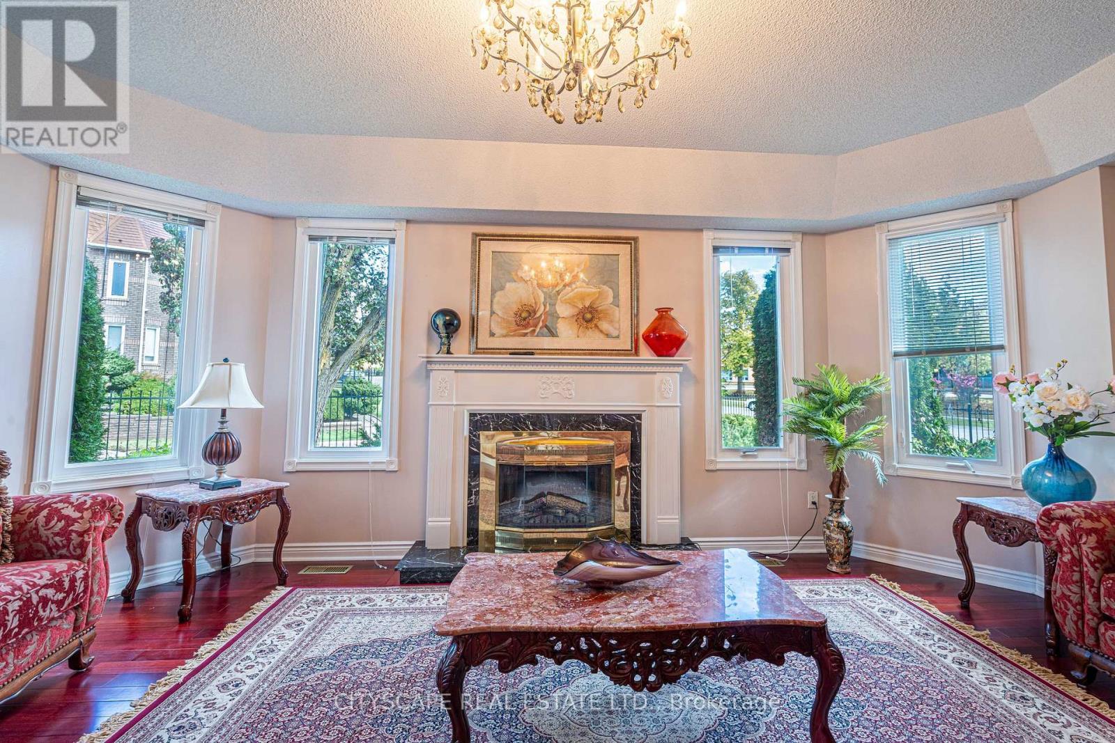 3721 Trelawny Circle, Mississauga, ON - Indoor Photo Showing Living Room With Fireplace
