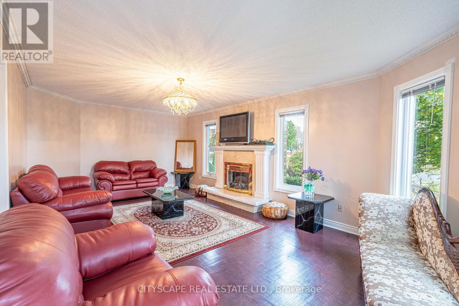 3721 Trelawny Circle, Mississauga, ON - Indoor Photo Showing Living Room With Fireplace