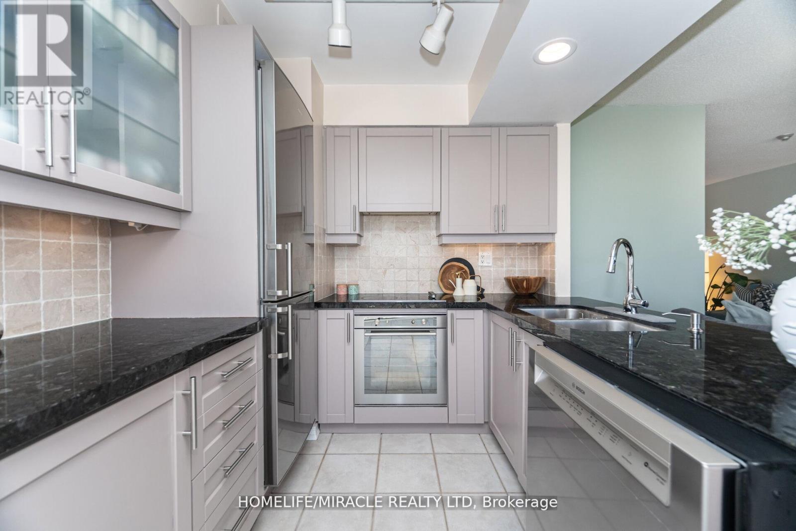 #1701 - 50 Eglinton Ave W, Mississauga, ON - Indoor Photo Showing Kitchen With Double Sink With Upgraded Kitchen