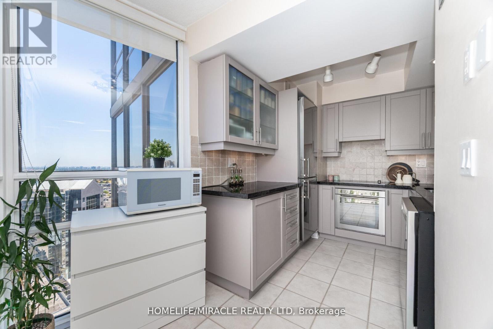 #1701 - 50 Eglinton Ave W, Mississauga, ON - Indoor Photo Showing Kitchen With Upgraded Kitchen