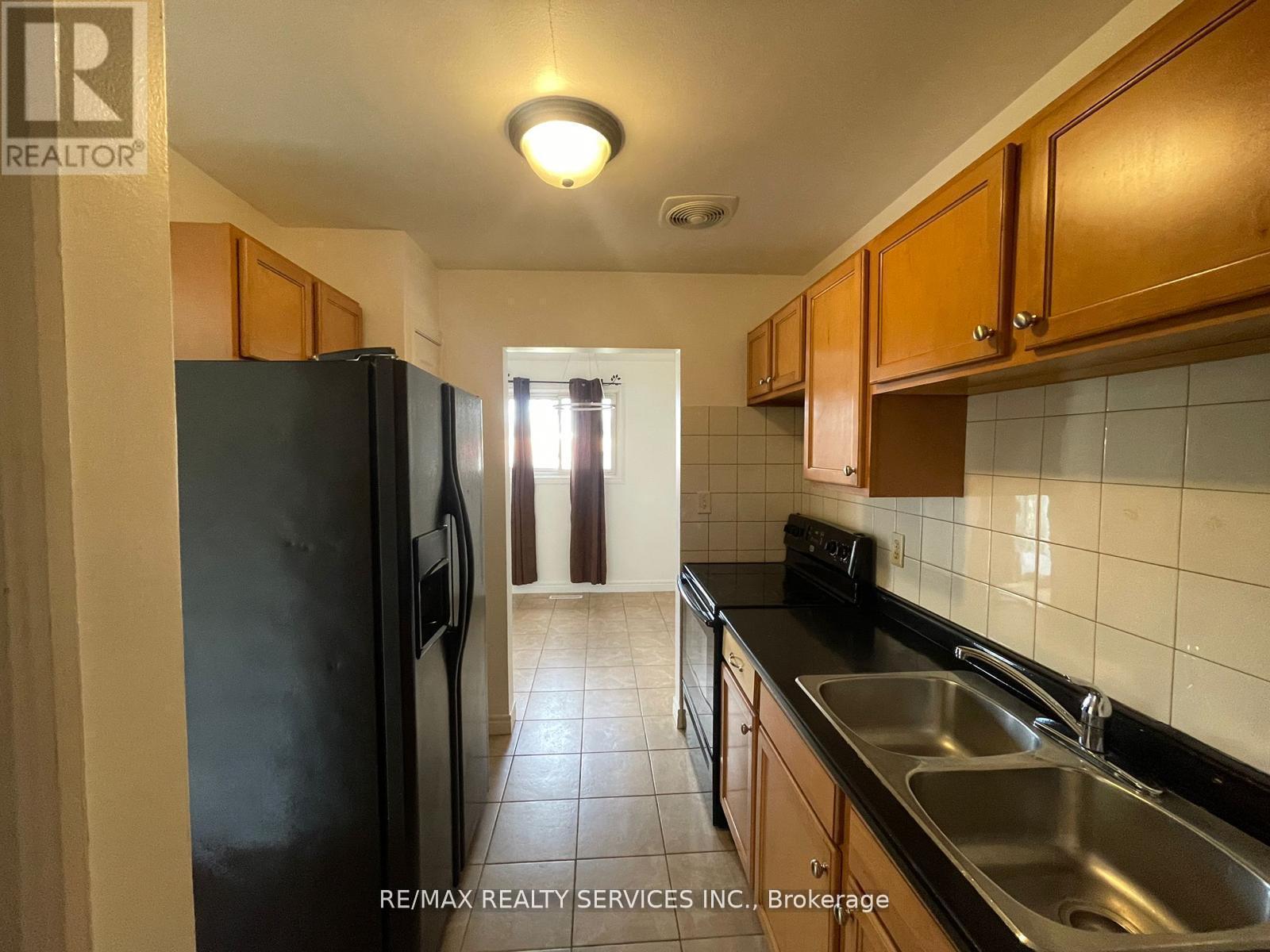 97 - 1730 Columbia Court, Windsor, ON - Indoor Photo Showing Kitchen With Double Sink