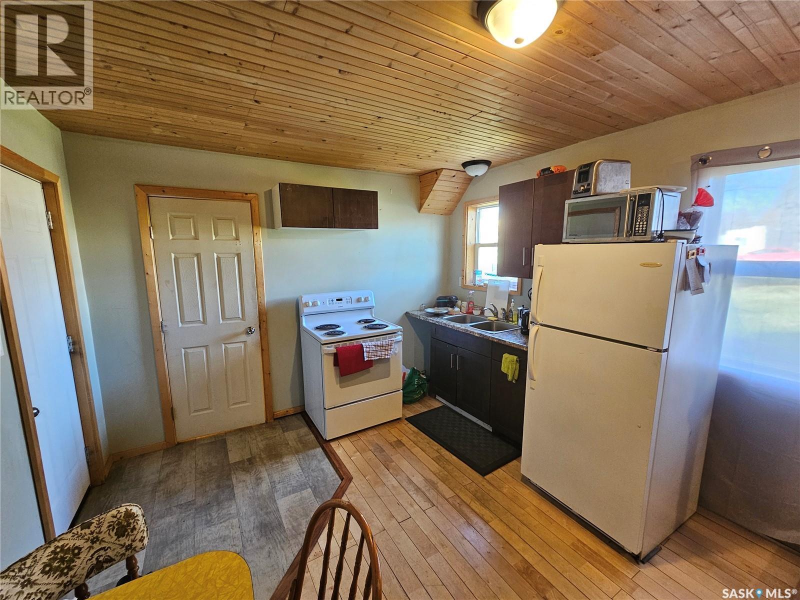 180 Main Street, Kisbey, SK - Indoor Photo Showing Kitchen With Double Sink