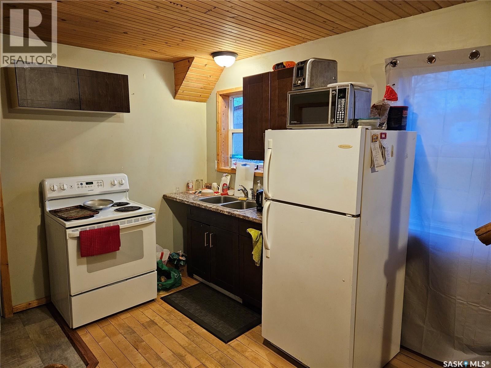 180 Main Street, Kisbey, SK - Indoor Photo Showing Kitchen With Double Sink