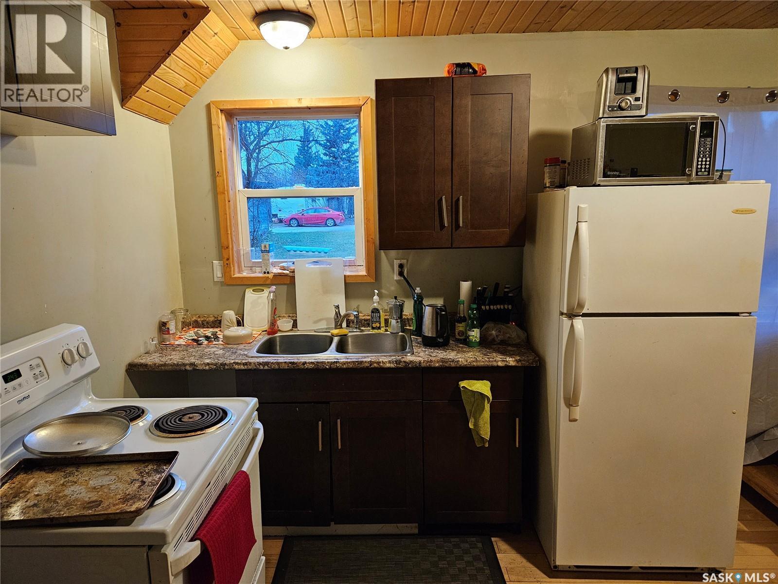 180 Main Street, Kisbey, SK - Indoor Photo Showing Kitchen With Double Sink