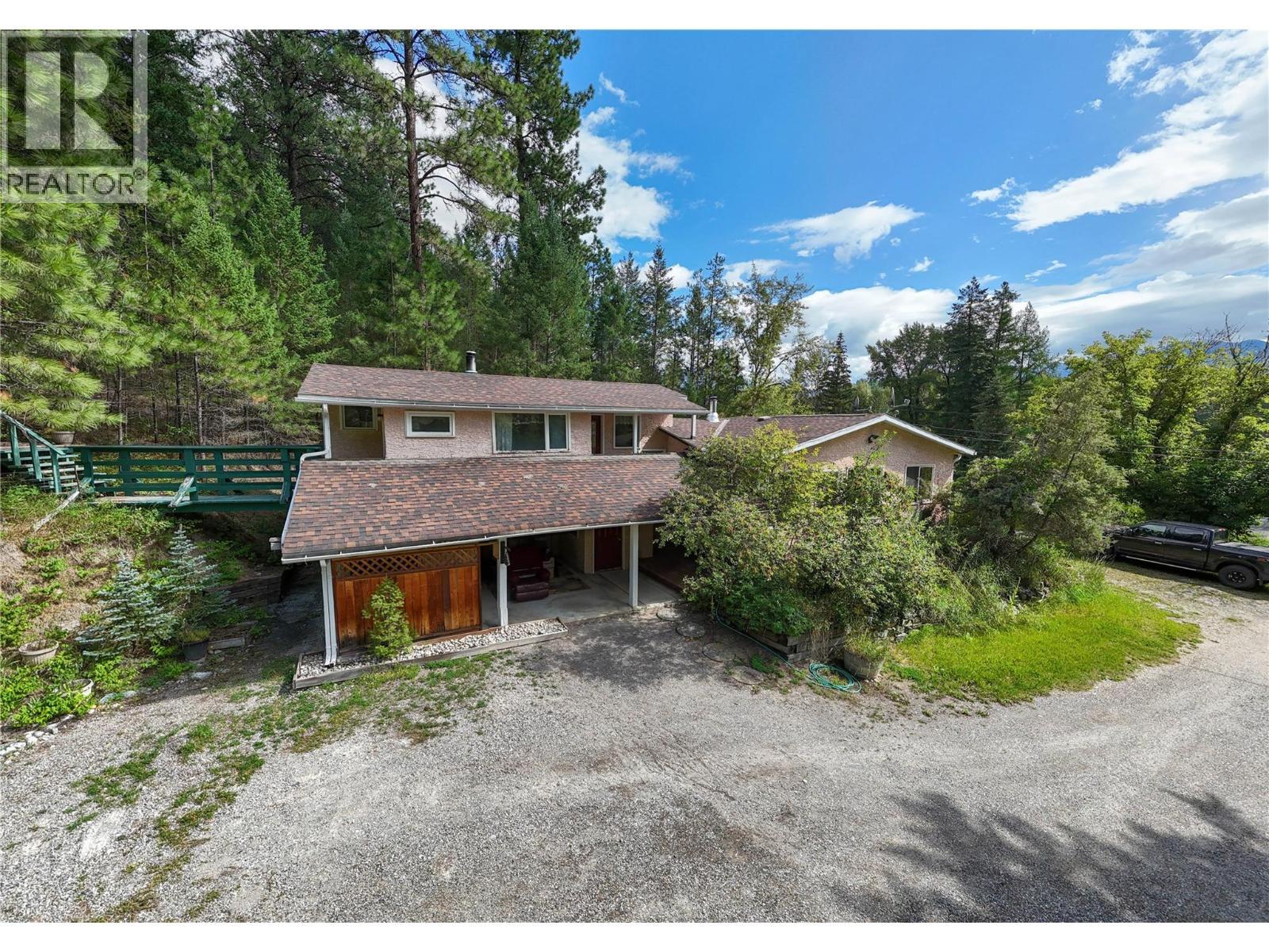 7825 Jaffray Baynes Lake Road Road, Jaffray, BC - Outdoor With Deck Patio Veranda