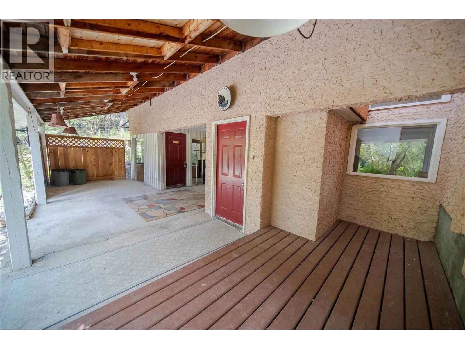 7825 Jaffray Baynes Lake Road Road, Jaffray, BC - Outdoor With Deck Patio Veranda With Exterior