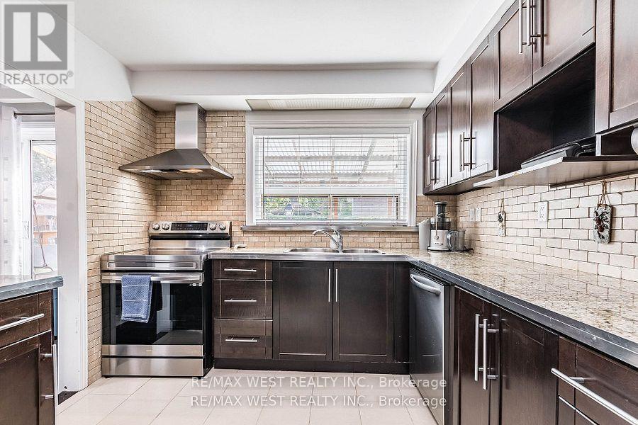 128 Mercury Road S, Toronto, ON - Indoor Photo Showing Kitchen With Double Sink