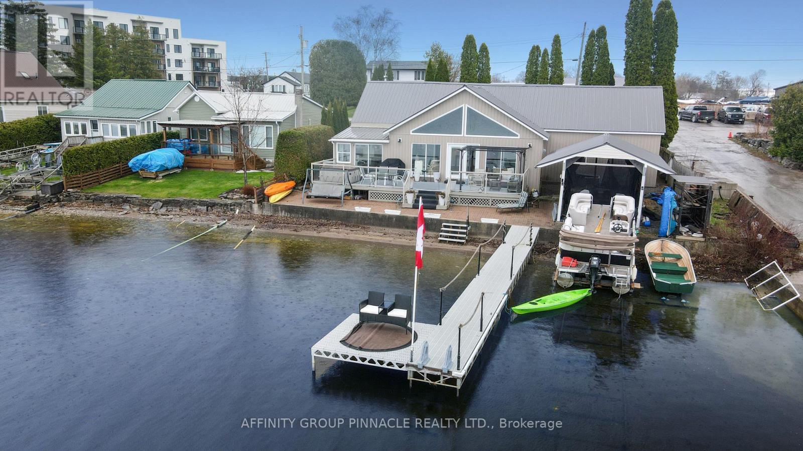 14 Oriole Road, Kawartha Lakes (Fenelon Falls), ON - Outdoor With Body Of Water With Deck Patio Veranda