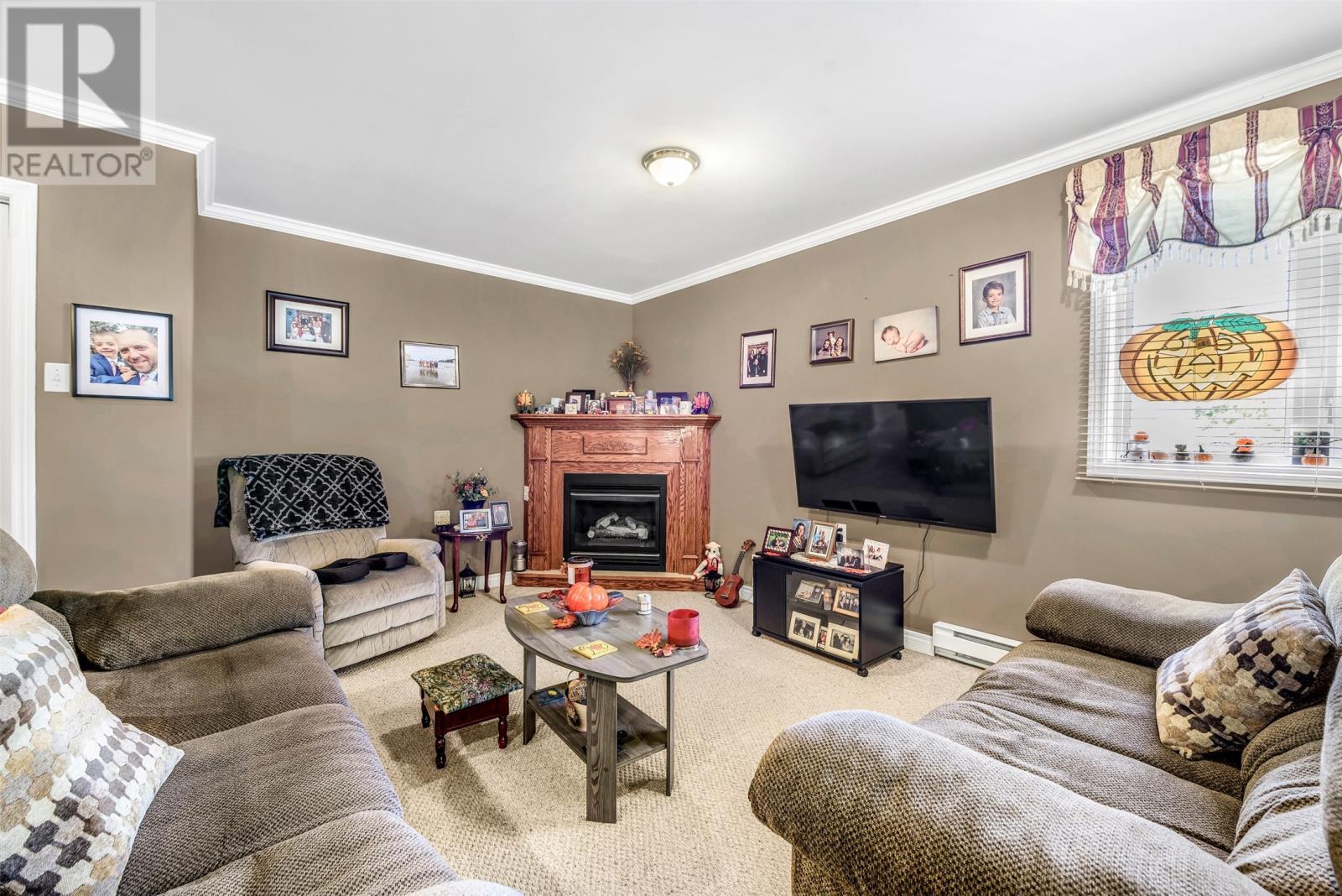 26 Birch Hill Road, Pouch Cove, NL - Indoor Photo Showing Living Room With Fireplace