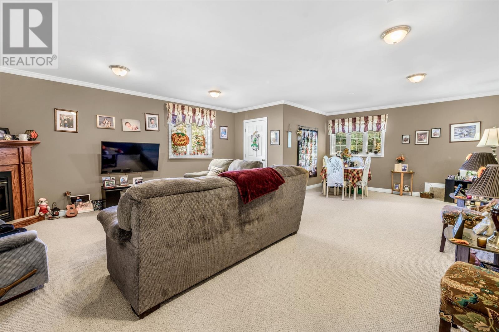 26 Birch Hill Road, Pouch Cove, NL - Indoor Photo Showing Living Room With Fireplace