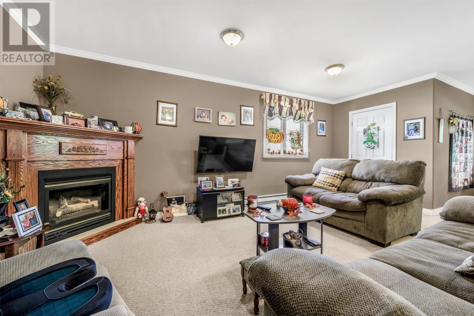26 Birch Hill Road, Pouch Cove, NL - Indoor Photo Showing Living Room With Fireplace