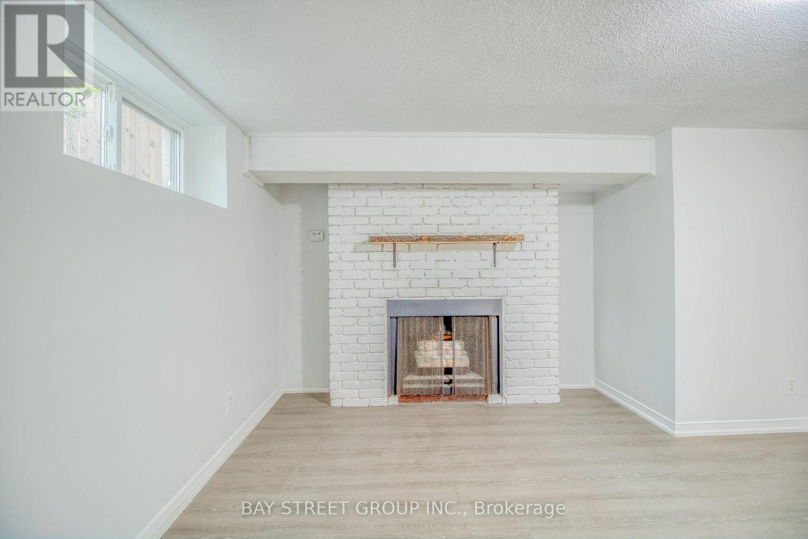 Basement #2 - 65 Davis Road N, Aurora, ON - Indoor Photo Showing Living Room With Fireplace