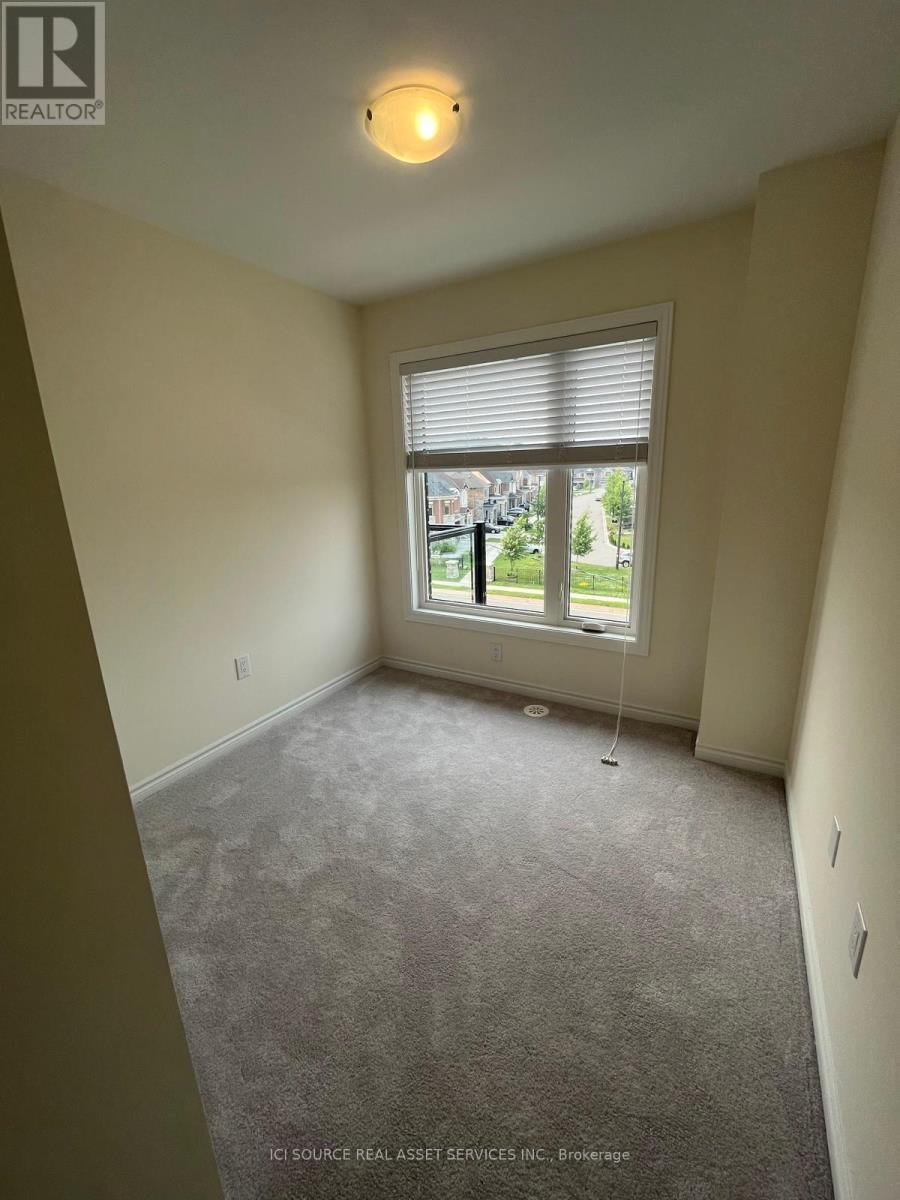 55 - 70 Knotsberry Circle, Brampton, ON - Indoor Photo Showing Other Room