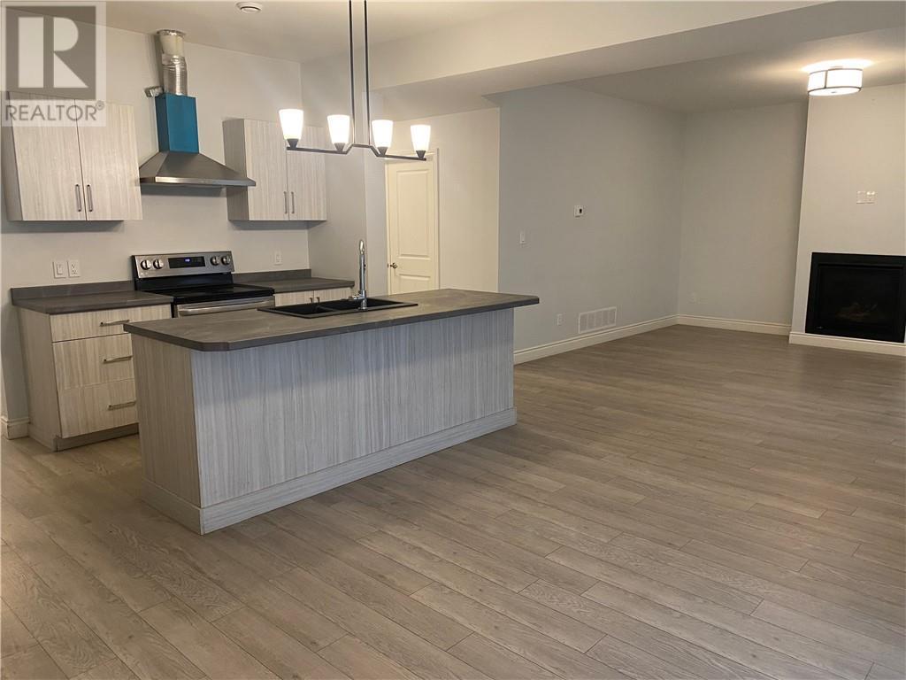 174 Jeanine Street, Sudbury, ON - Indoor Photo Showing Kitchen With Fireplace