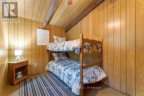 1033 Bayview Point Road, Lake Of Bays (Ridout), ON - Indoor Photo Showing Bedroom