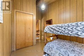 1033 Bayview Point Road, Lake Of Bays (Ridout), ON - Indoor Photo Showing Bedroom