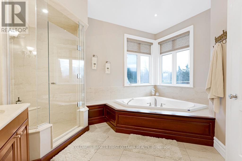 Ensuite glass shower & soaker top - 556 West Point Drive, Drummond/North Elmsley, ON - Indoor Photo Showing Bathroom