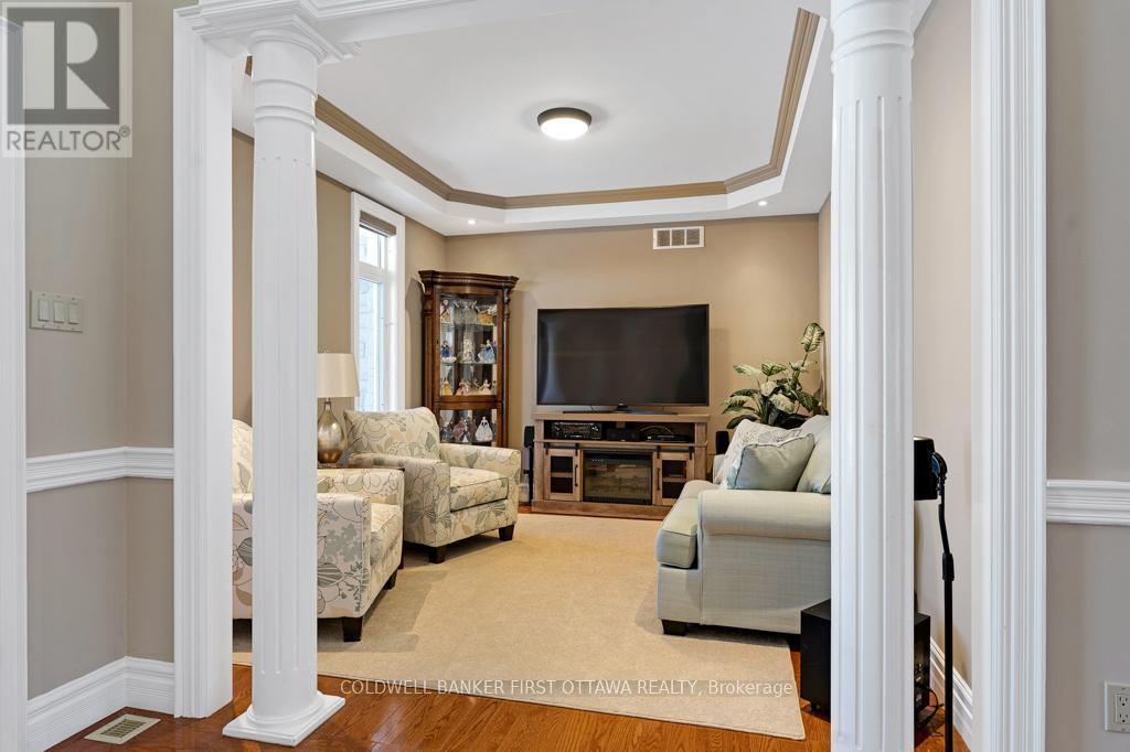 To left of foyer is den with tray ceiling - 556 West Point Drive, Drummond/North Elmsley, ON - Indoor Photo Showing Other Room