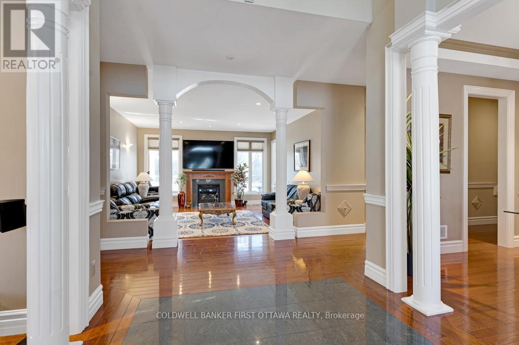 Foyer opens to living room - 556 West Point Drive, Drummond/North Elmsley, ON - Indoor Photo Showing Other Room With Fireplace