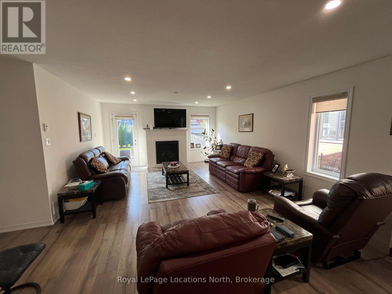 66 Hughes Street, Collingwood, ON - Indoor Photo Showing Living Room With Fireplace