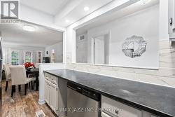 Kitchen with clear sightlines to dining area -