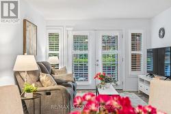 Well-lit living room with large window&garden view -