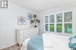 Sun-filled room overlooking greenery -