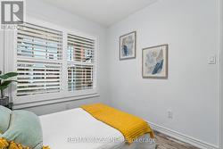 Second bedroom with charming front view -