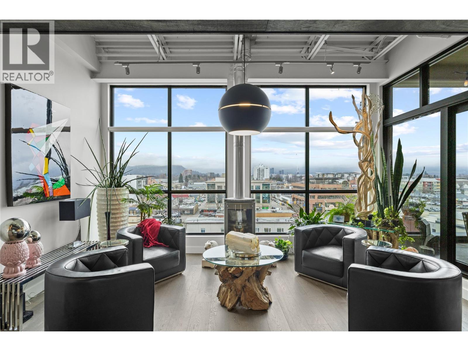 Bright living room with floor to ceiling windows - 1630 Pandosy Street Unit# 605, Kelowna, BC - Indoor Photo Showing Other Room