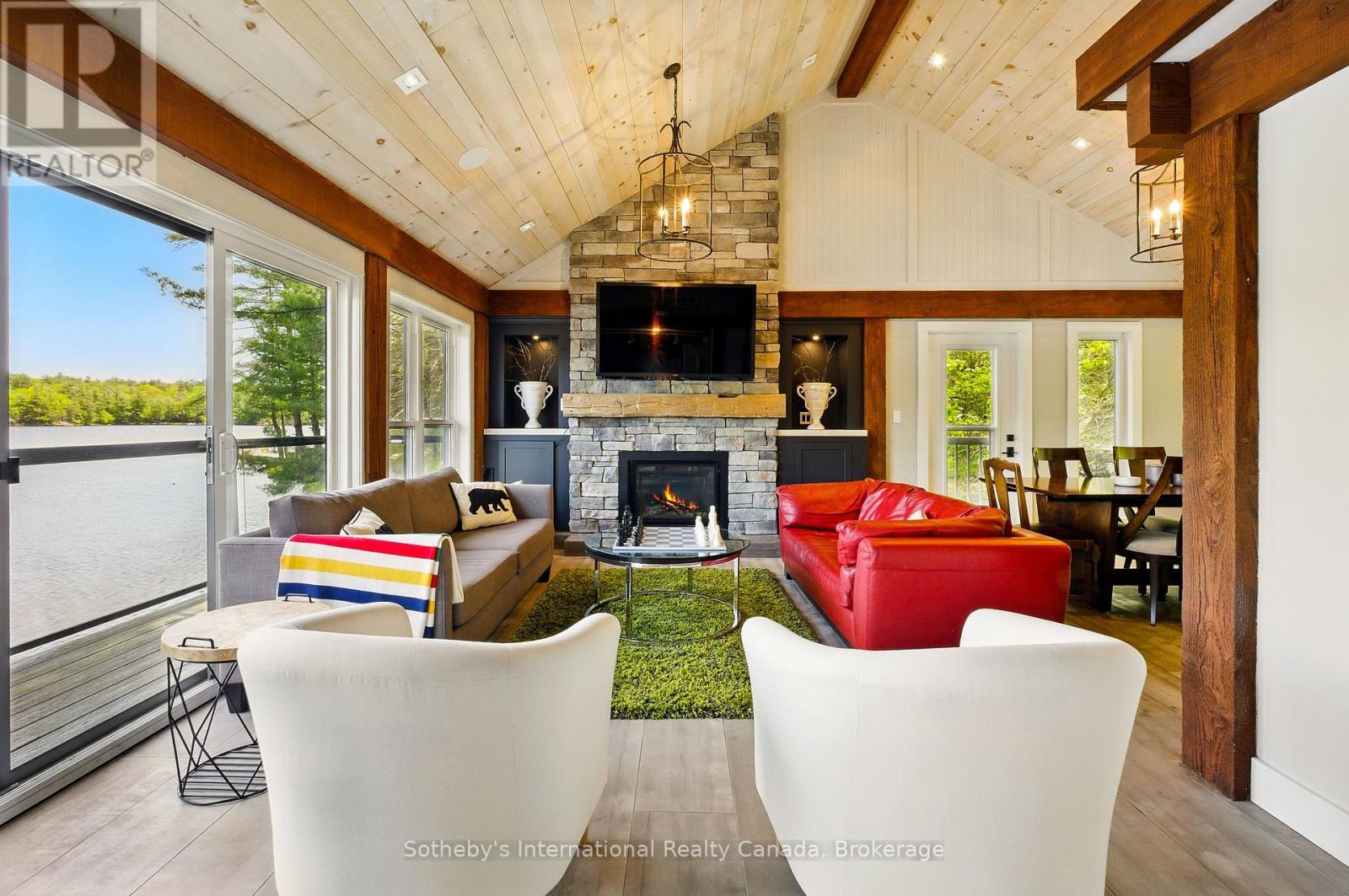 6394 Go Home Lake Shore, Georgian Bay (Gibson), ON - Indoor Photo Showing Living Room With Fireplace