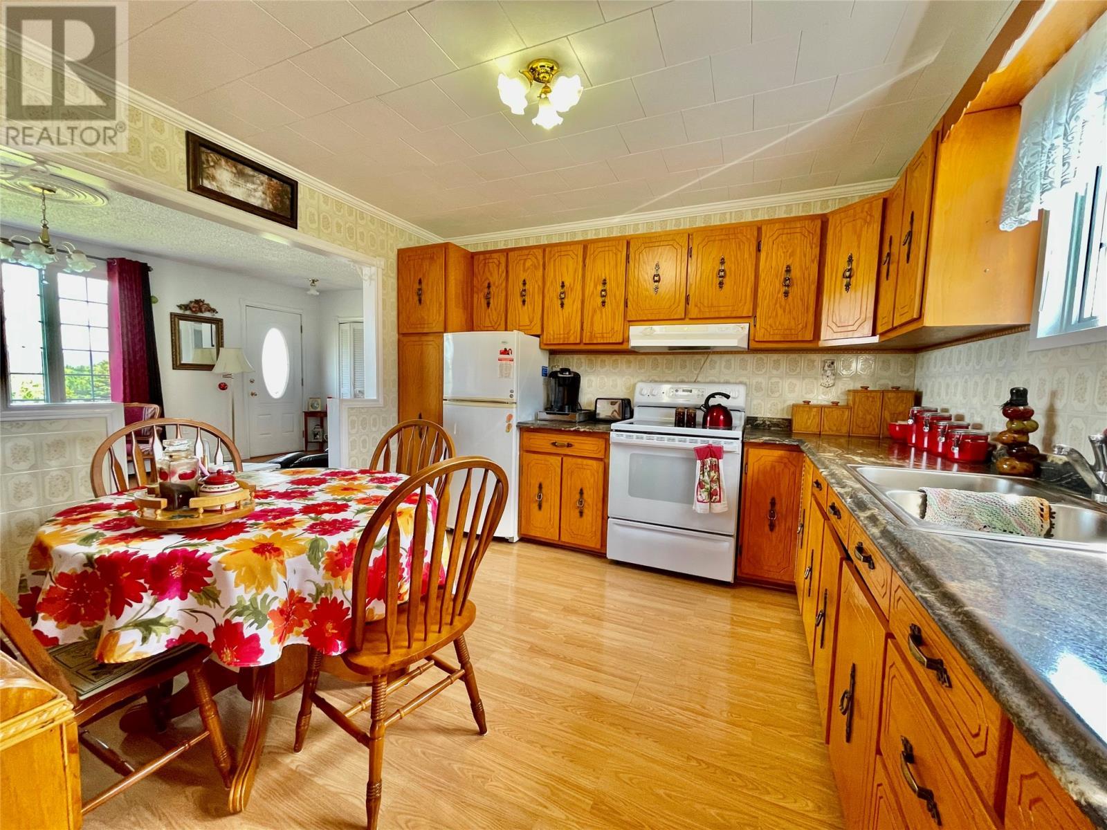 106 Main Street, Charlottetown, NL - Indoor Photo Showing Kitchen With Double Sink