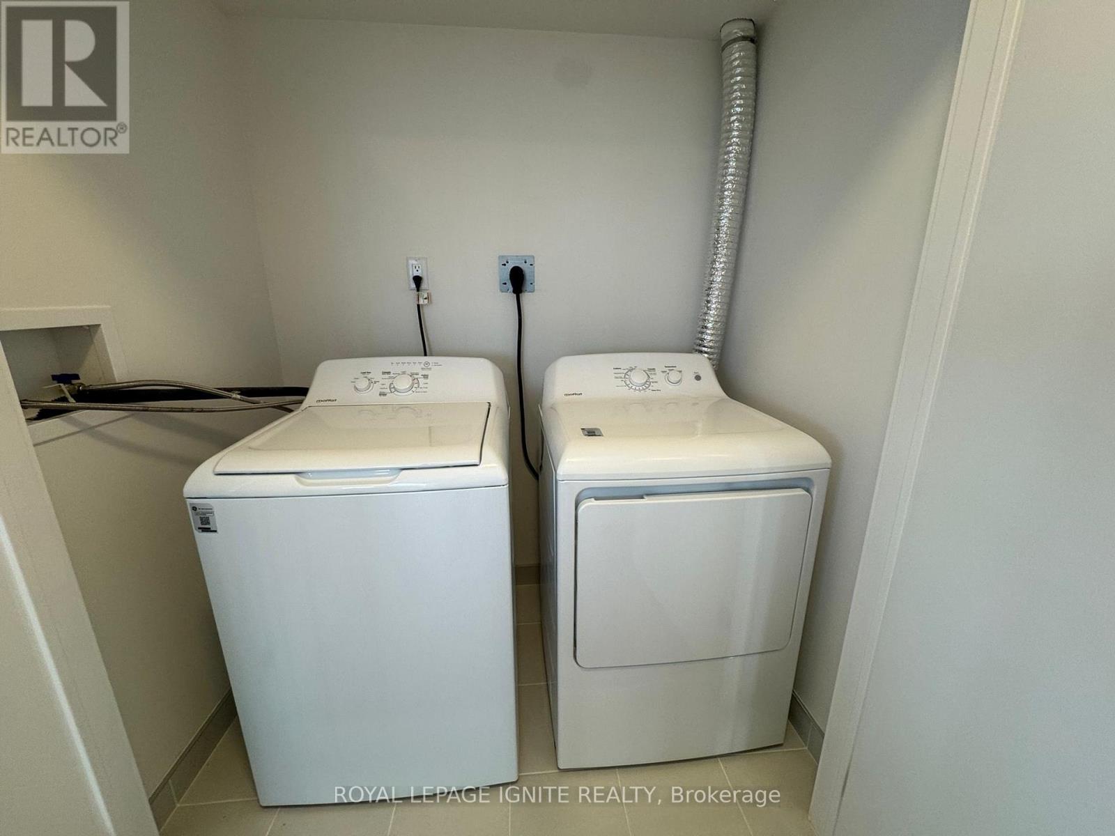 1103 - 55 Clarington Boulevard, Clarington, ON - Indoor Photo Showing Laundry Room