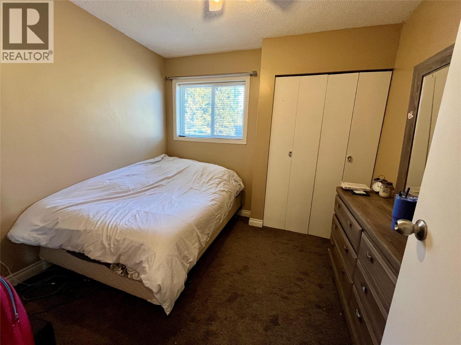128 Peace River Crescent, Tumbler Ridge, BC - Indoor Photo Showing Bedroom