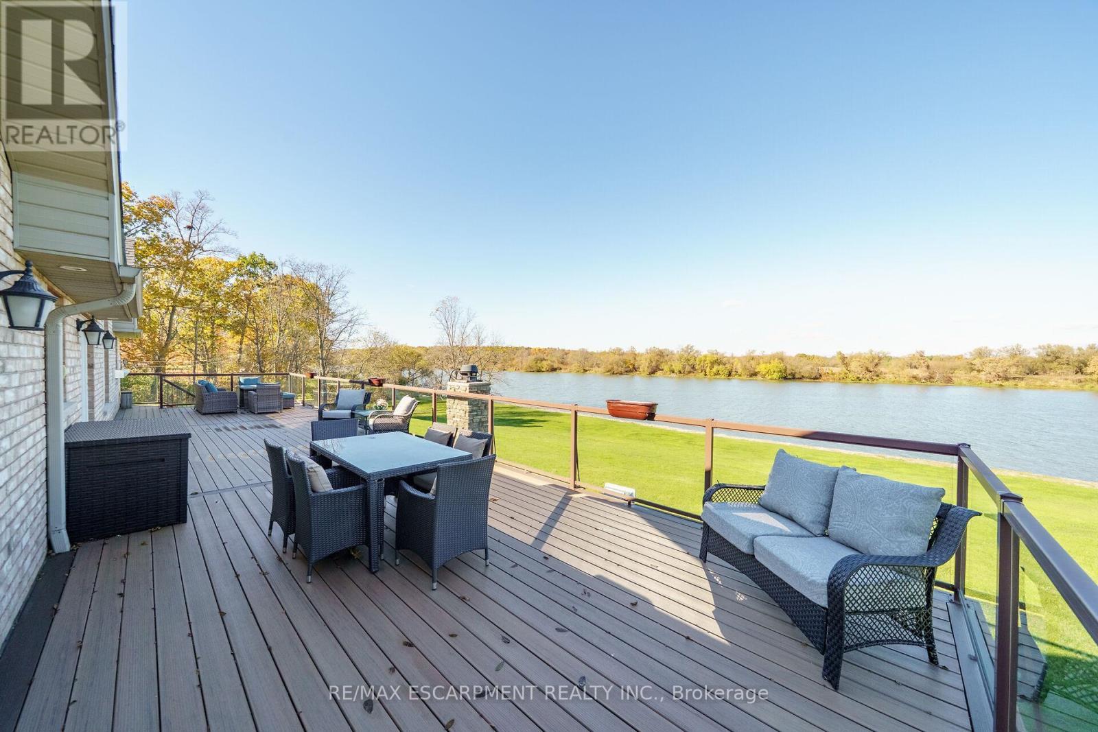 1140 River Road, Haldimand, ON - Outdoor With Body Of Water With Deck Patio Veranda With Exterior