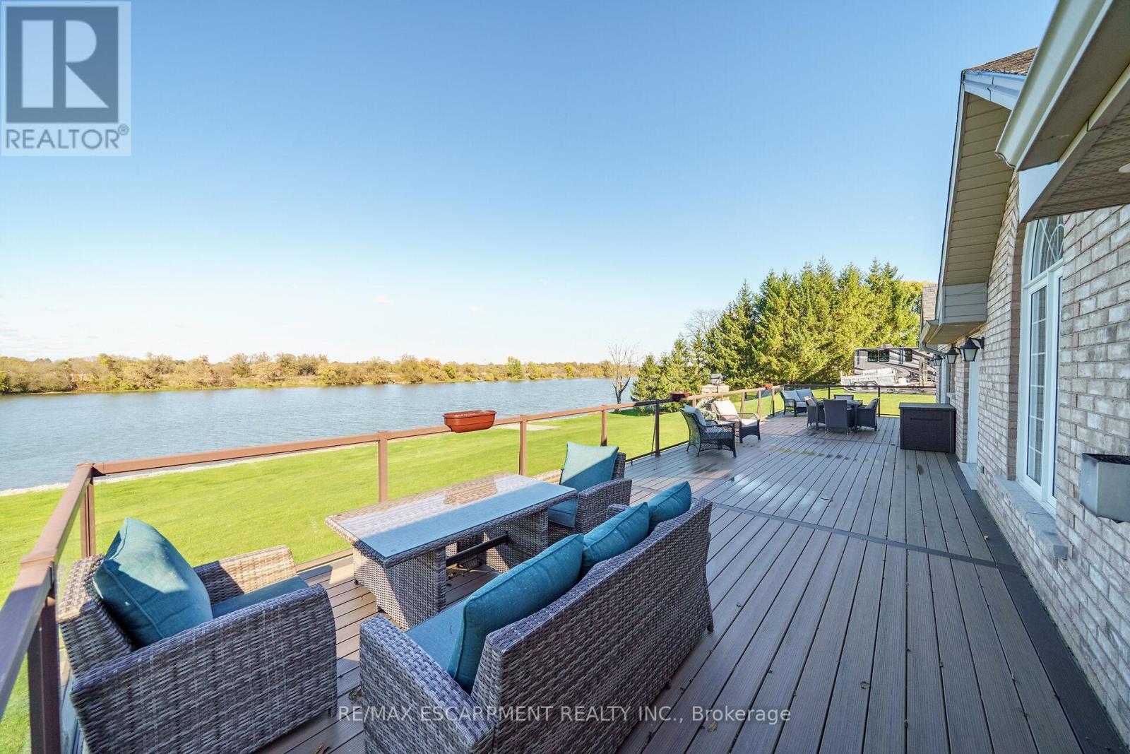1140 River Road, Haldimand, ON - Outdoor With Body Of Water With Deck Patio Veranda