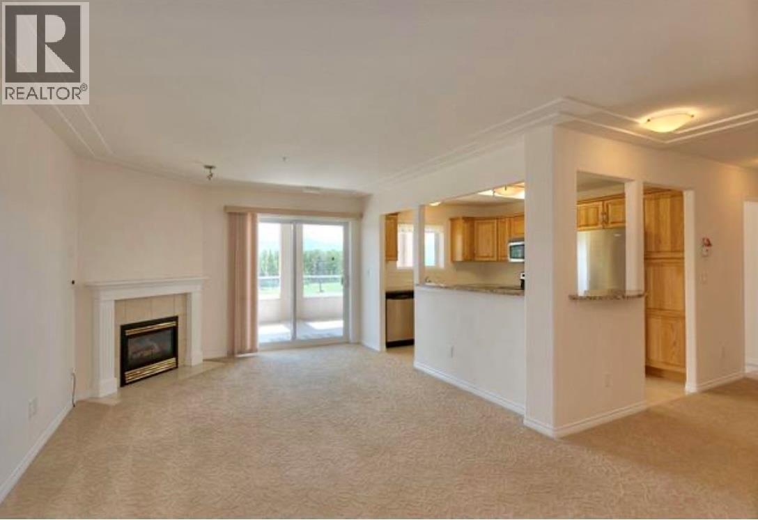 1967 Underhill Street Unit# 604, Kelowna, BC - Indoor With Fireplace