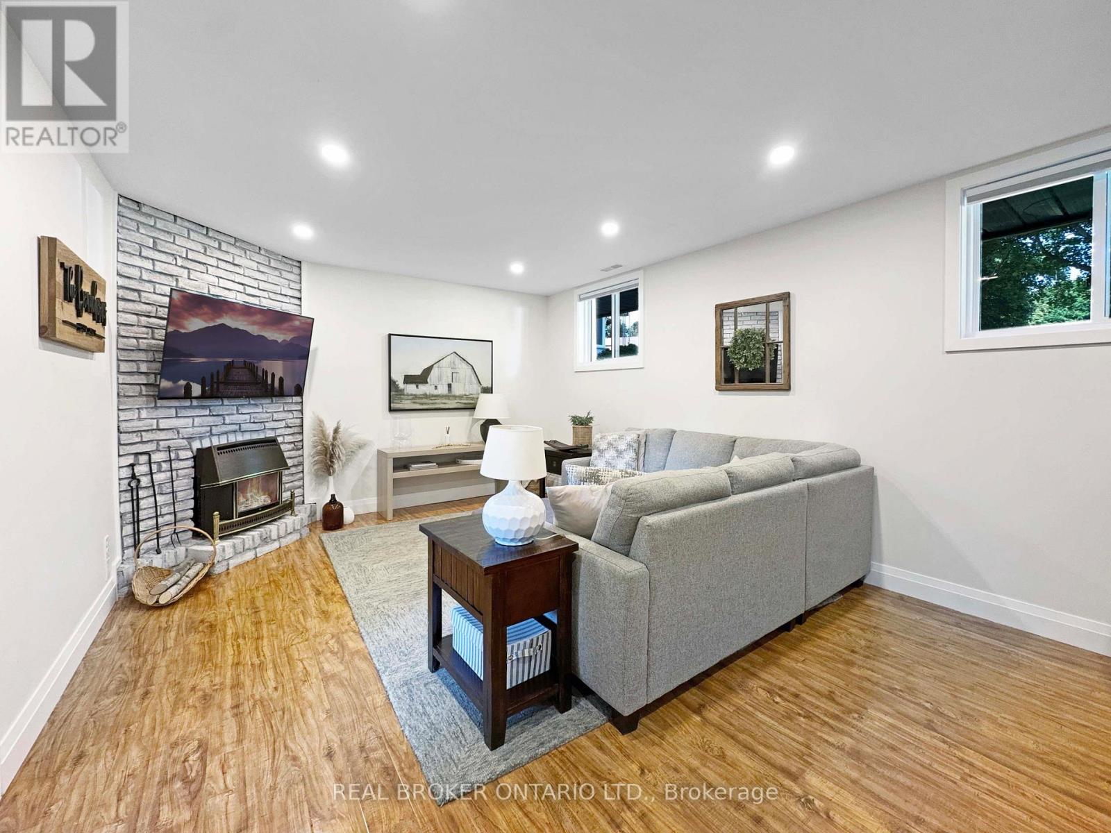 9 Normandy Circle, Norfolk, ON - Indoor Photo Showing Other Room With Fireplace